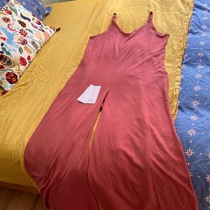 Athleta Wind Down V Neck Romper; Red clay color; M; Never worn; Sooo soft & cool